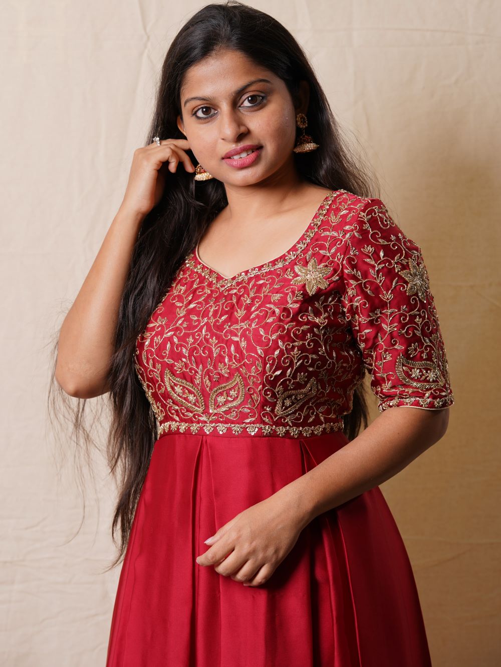 Deep red long dress with a hand emdroidered body and dupatta